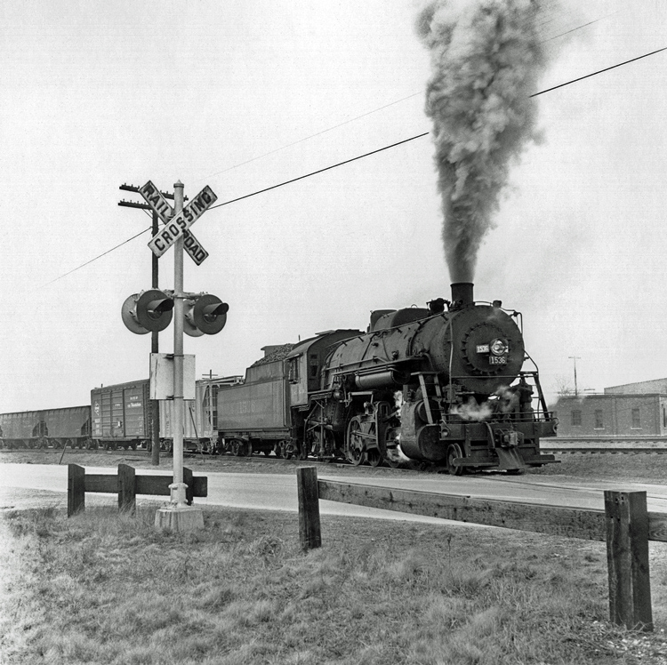 Illinois Central Railroad Engine 1536 at Railroad Crossing